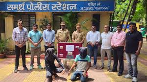 Police standing outside ATM kiosk in Pune